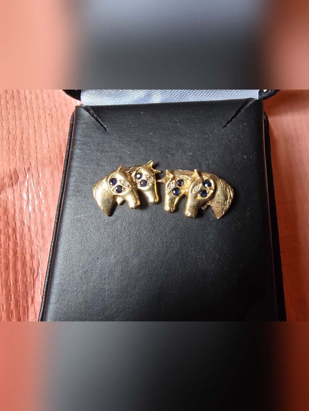 Beautiful gold horse earrings